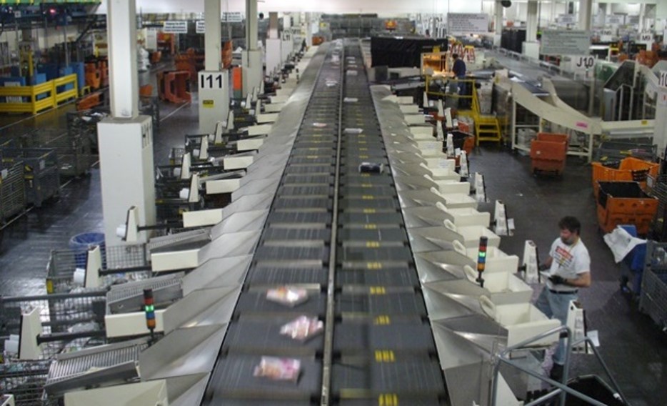 Photograph of USPS package sorting machine